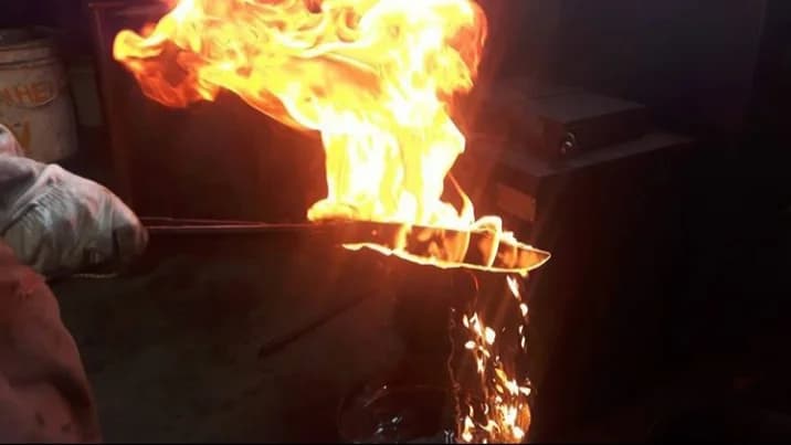 A blade held in the flames of the R.Vilar workshop